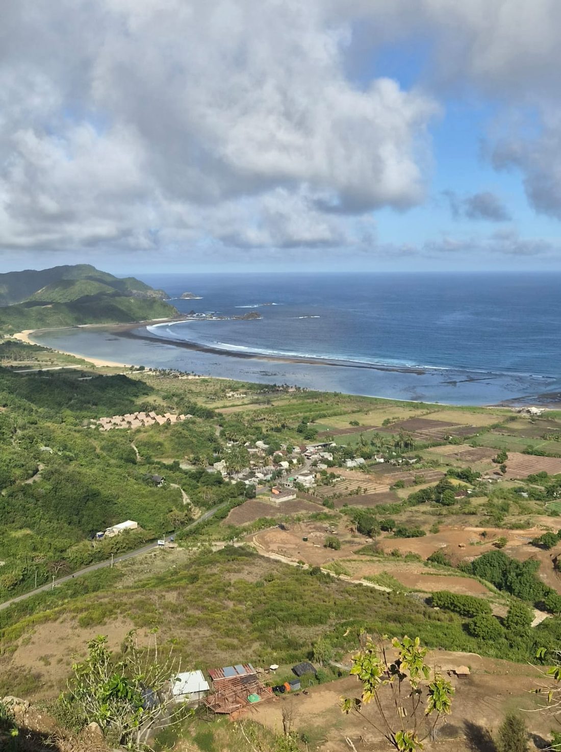 Coastal land at Lombok with agricultural plots in the foreground